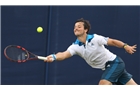EASTBOURNE, ENGLAND - JUNE 14: James Marsalek of Great Britain plays a forehand against Divij Shran of India during their Men's Singles first round qualifying match on day one of the Aegon International at Devonshire Park on June 14, 2014 in Eastbourne, England.  (Photo by Steve Bardens/Getty Images)